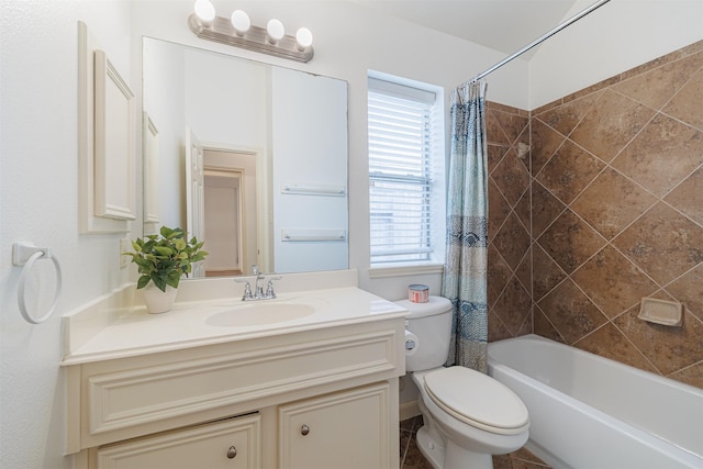 full bathroom featuring vanity, shower / bath combo with shower curtain, and toilet