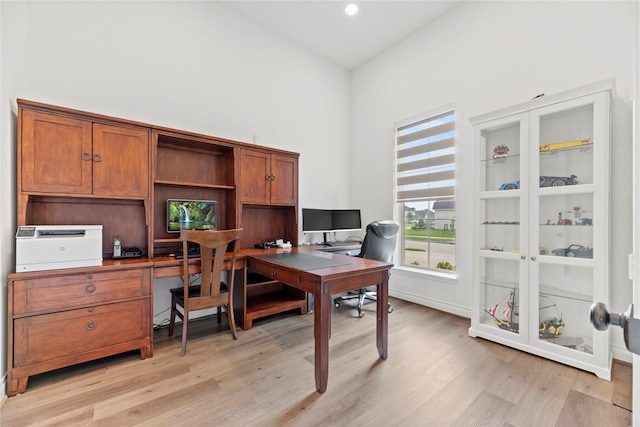 2122 Rosybill Dr, Katy, TX 77494 - office space with recessed lighting, baseboards, light wood-type flooring, and a towering ceiling