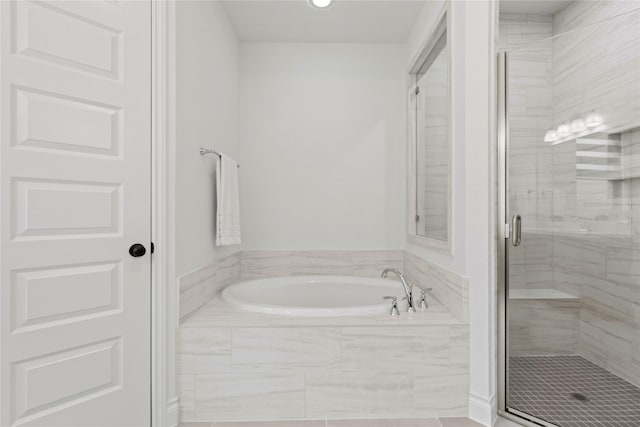 2122 Rosybill Dr, Katy, TX 77494 - bathroom with recessed lighting, tile patterned floors, a bath, and a stall shower