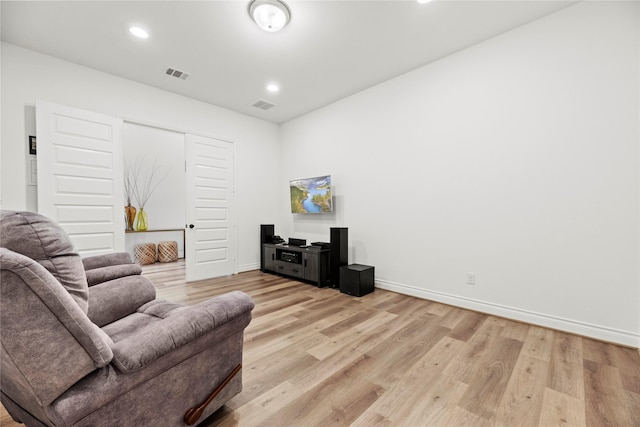 2122 Rosybill Dr, Katy, TX 77494 - living room with visible vents, baseboards, and light wood-type flooring
