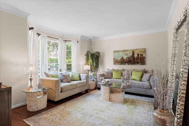 living area with baseboards, ornamental molding, and wood finished floors