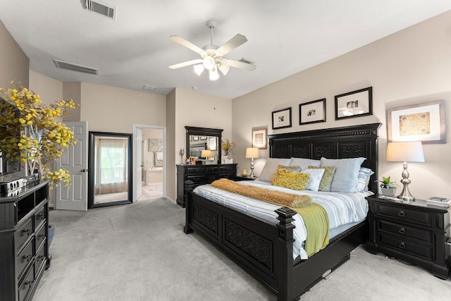 bedroom with light carpet, a ceiling fan, connected bathroom, and visible vents