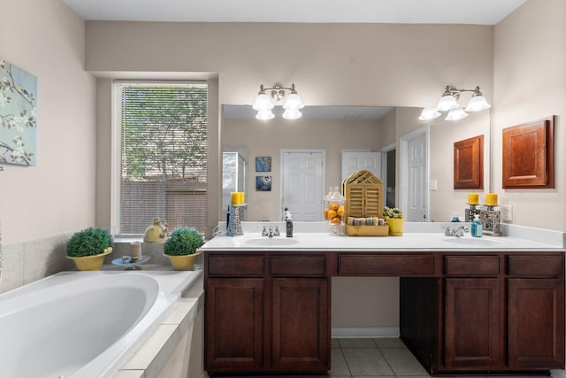 bathroom with a garden tub, a sink, tile patterned floors, and double vanity