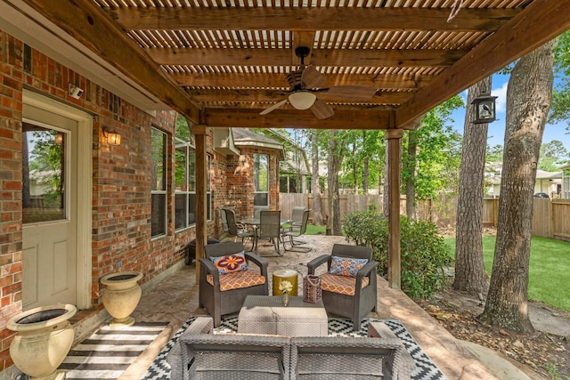 view of patio featuring ceiling fan, outdoor dining area, a fenced backyard, an outdoor hangout area, and a pergola