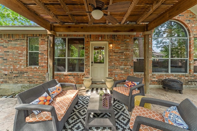 view of patio featuring a ceiling fan and outdoor lounge area