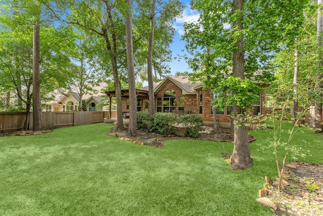 view of yard featuring fence