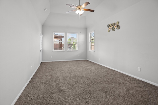 empty room featuring a ceiling fan, baseboards, carpet, and high vaulted ceiling