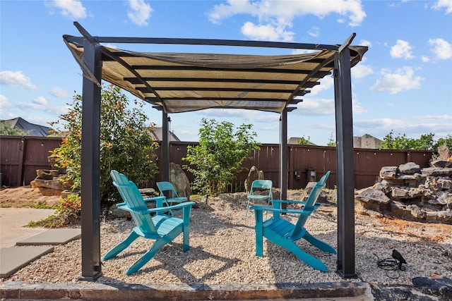 view of patio / terrace featuring a fenced backyard and a pergola