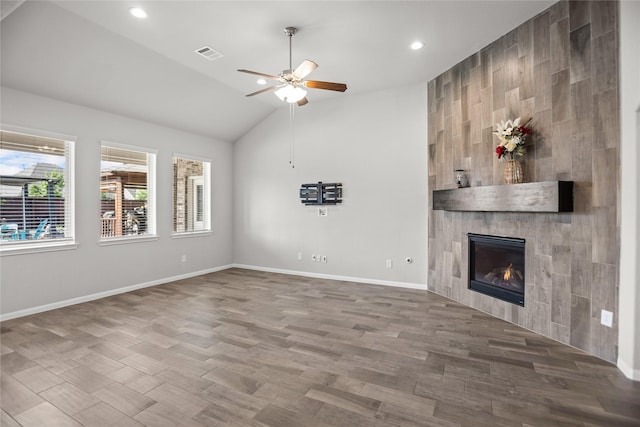 unfurnished living room featuring visible vents, recessed lighting, a ceiling fan, and vaulted ceiling