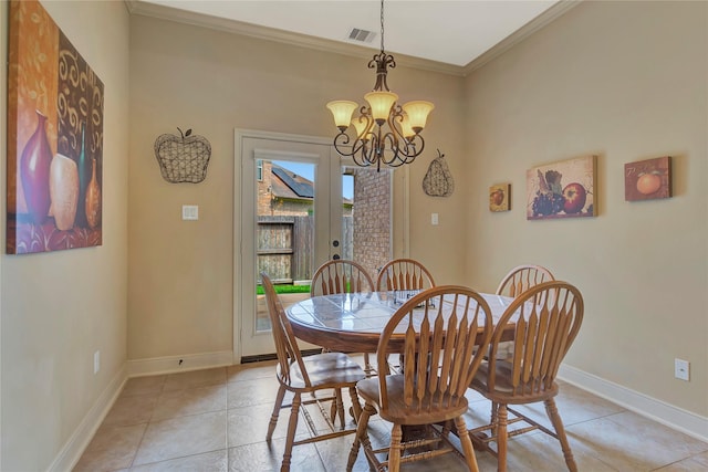 dining area with crown molding, baseboards, visible vents, and an inviting chandelier