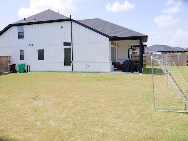 view of outbuilding with fence