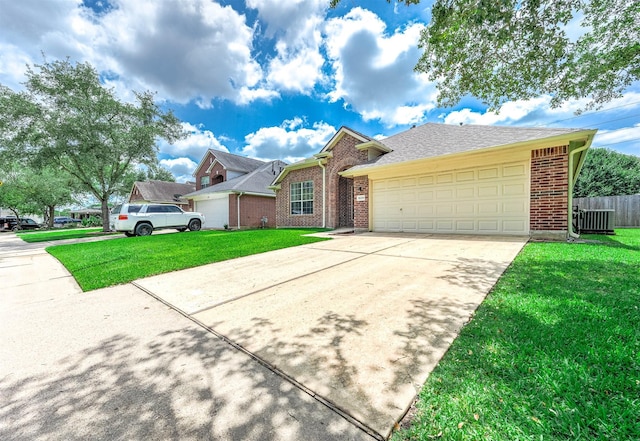 view of front of property with brick siding, concrete driveway, an attached garage, and central AC unit