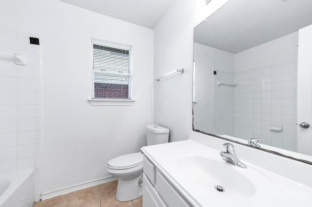 bathroom featuring toilet, tile patterned floors, baseboards, vanity, and  shower combination