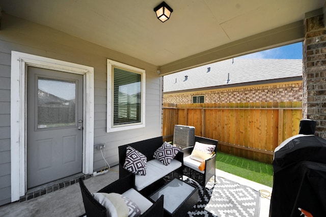 view of patio / terrace featuring fence, an outdoor hangout area, and area for grilling