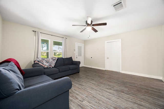 415 N Meyer St, Sealy, TX 77474 - living area featuring a ceiling fan, baseboards, visible vents, and wood finished floors