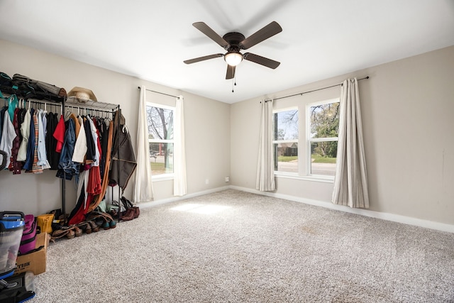 415 N Meyer St, Sealy, TX 77474 - unfurnished bedroom featuring baseboards, a ceiling fan, and carpet flooring