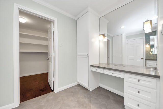 bathroom with crown molding, recessed lighting, baseboards, and vanity