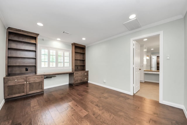 unfurnished office featuring built in study area, recessed lighting, dark wood-style flooring, and crown molding