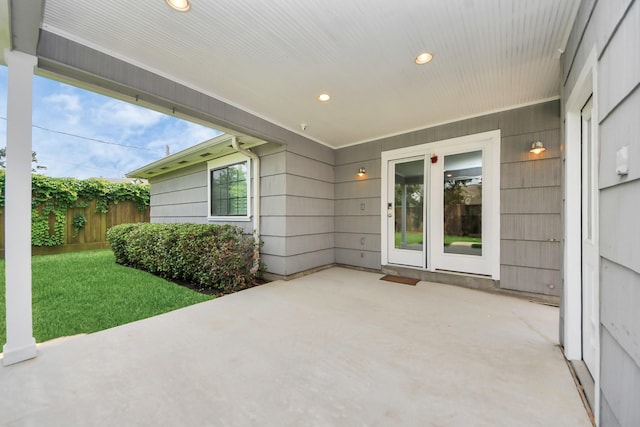 view of patio featuring fence