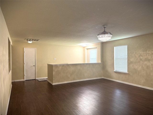 7130 Liberty Oak Ct, Houston, TX 77049 - unfurnished room featuring dark wood-style flooring and baseboards