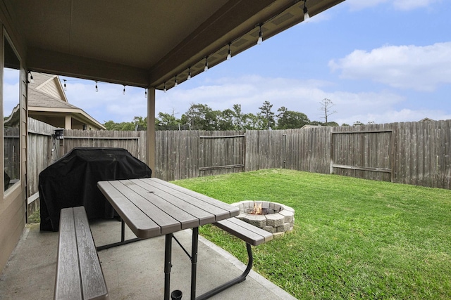 23706 Bluewood Trce, Tomball, TX 77375 - view of yard with an outdoor fire pit and a patio