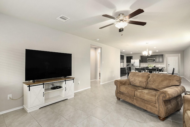 23706 Bluewood Trce, Tomball, TX 77375 - living area featuring a chandelier, baseboards, light tile patterned floors, a ceiling fan, and recessed lighting