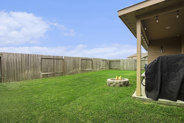 23706 Bluewood Trce, Tomball, TX 77375 - view of yard featuring an outdoor fire pit