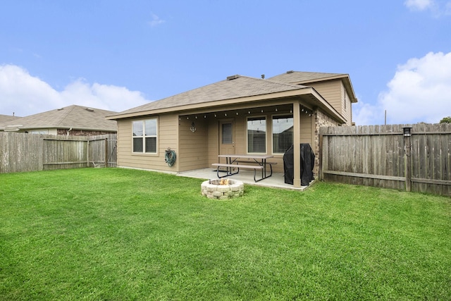 23706 Bluewood Trce, Tomball, TX 77375 - rear view of property featuring an outdoor fire pit and a patio