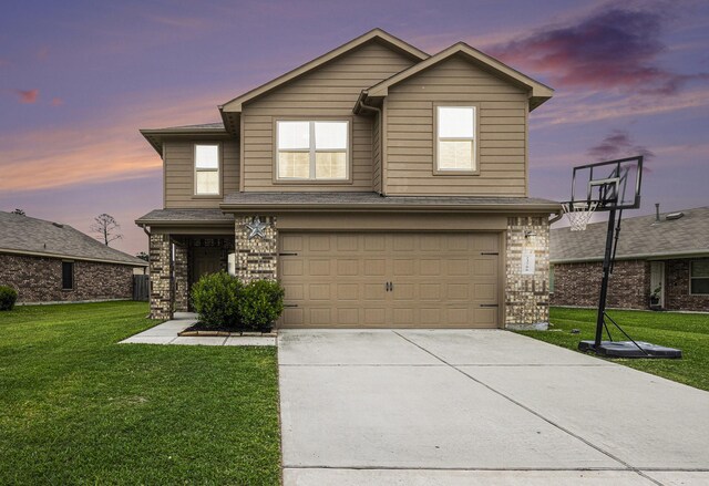 23706 Bluewood Trce, Tomball, TX 77375 - traditional-style home with an attached garage, a lawn, concrete driveway, and stone siding