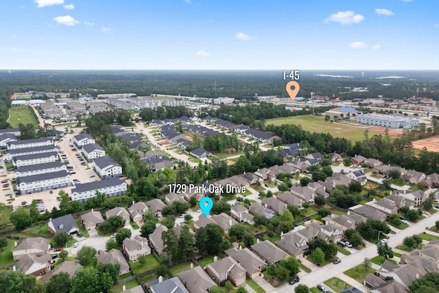 birds eye view of property with a residential view