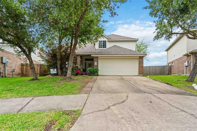 102 Pebble Walk Ln, Dickinson, TX 77539 - traditional-style home featuring concrete driveway, an attached garage, brick siding, and a shingled roof