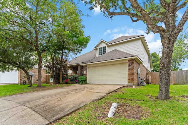 102 Pebble Walk Ln, Dickinson, TX 77539 - traditional-style home featuring brick siding, a garage, concrete driveway, and roof with shingles