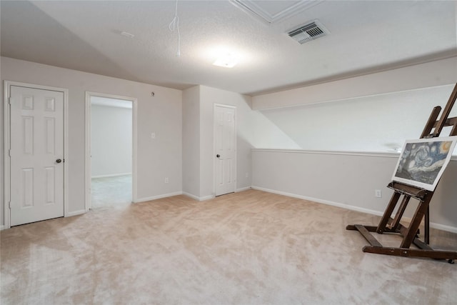 102 Pebble Walk Ln, Dickinson, TX 77539 - bonus room with carpet, lofted ceiling, baseboards, and attic access