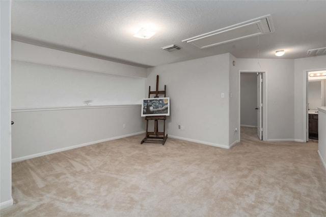 102 Pebble Walk Ln, Dickinson, TX 77539 - unfurnished room featuring attic access, carpet flooring, baseboards, and a textured ceiling
