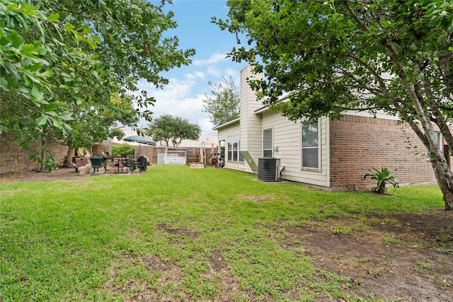 102 Pebble Walk Ln, Dickinson, TX 77539 - view of yard featuring central AC