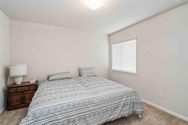 102 Pebble Walk Ln, Dickinson, TX 77539 - bedroom featuring baseboards and carpet floors