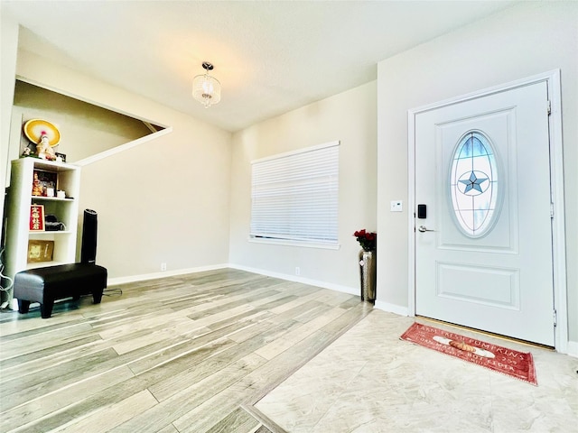 13415 Naples Bridge Rd, Sugar Land, TX 77498 - foyer featuring baseboards and light wood-style flooring