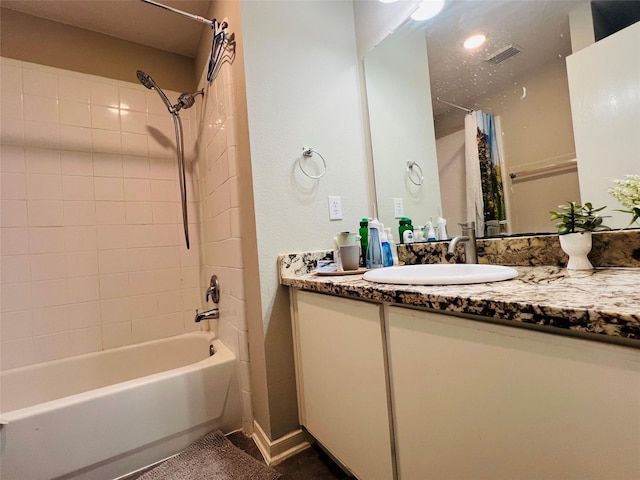 13415 Naples Bridge Rd, Sugar Land, TX 77498 - bathroom featuring shower / bath combo with shower curtain, visible vents, and vanity