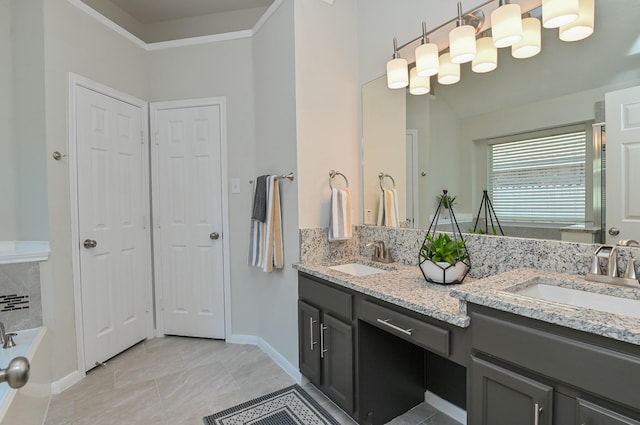 full bathroom with a sink, tile patterned floors, and double vanity