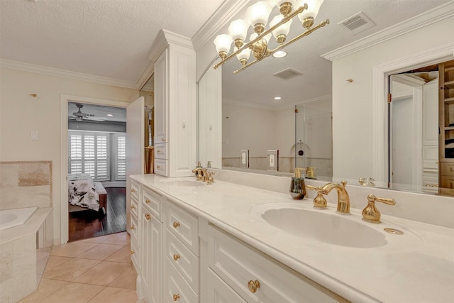 full bath featuring visible vents, a sink, and tile patterned floors