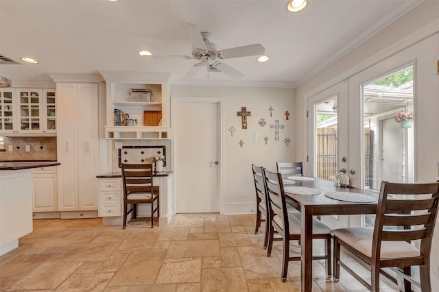 dining area featuring stone tile floors, recessed lighting, a ceiling fan, visible vents, and ornamental molding