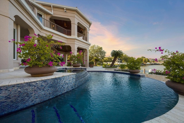 pool featuring a water view