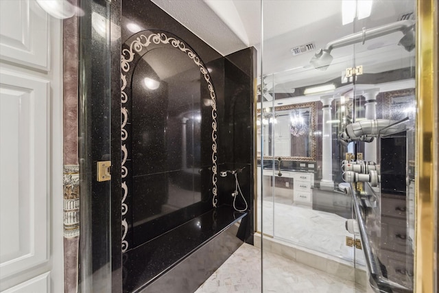 bathroom with tile patterned floors and visible vents