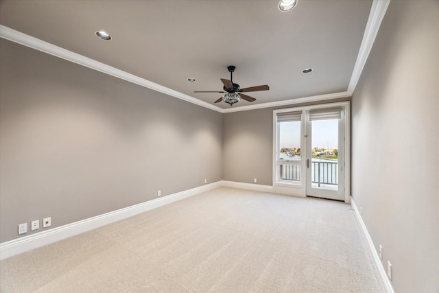 empty room with a ceiling fan, baseboards, ornamental molding, light carpet, and recessed lighting