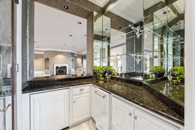 bar with ornamental molding and marble finish floor