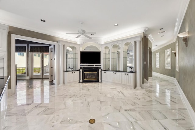 unfurnished living room featuring a glass covered fireplace, a ceiling fan, recessed lighting, visible vents, and ornamental molding