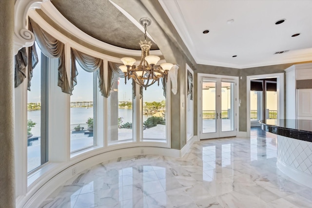 interior space featuring a healthy amount of sunlight, french doors, and a notable chandelier