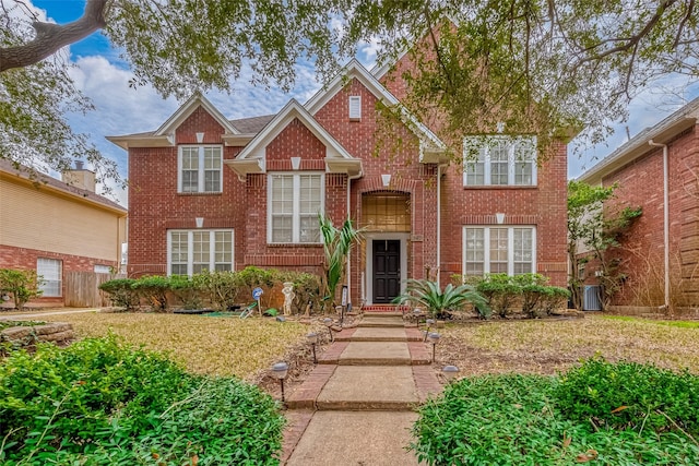 view of front of property featuring brick siding