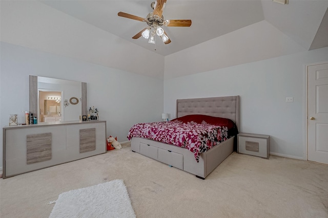 carpeted bedroom with ceiling fan, lofted ceiling, and baseboards