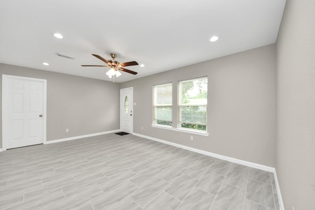 unfurnished room featuring visible vents, recessed lighting, and ceiling fan